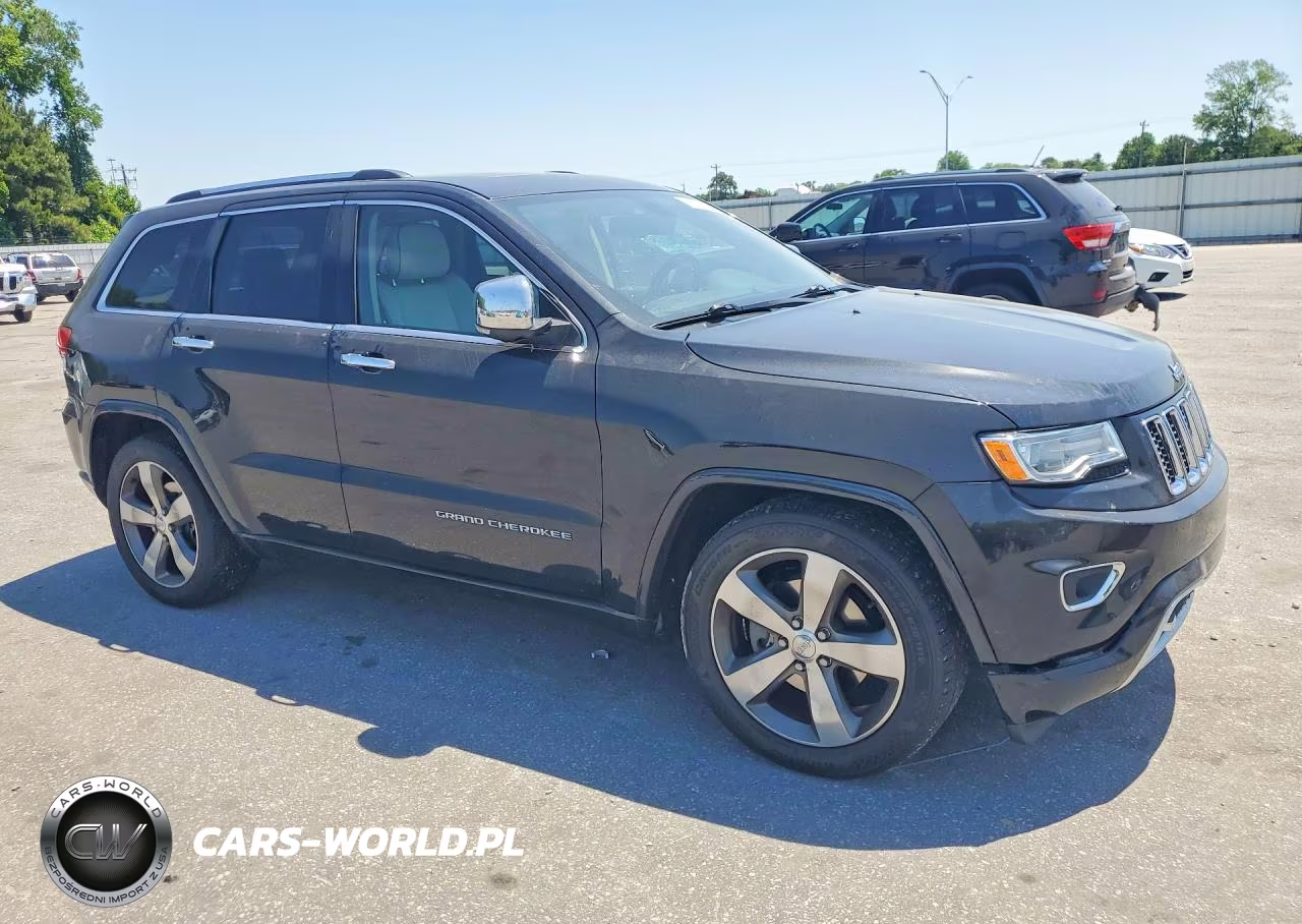 2015 Jeep Grand Cherokee Overland VIN:1C4RJFCG5FC211458 - 4