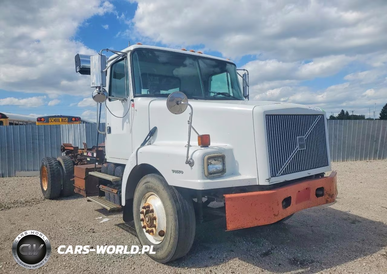 1999 Volvo Wg Roll-Off Container Truck – zdjęcie 1 z 10
