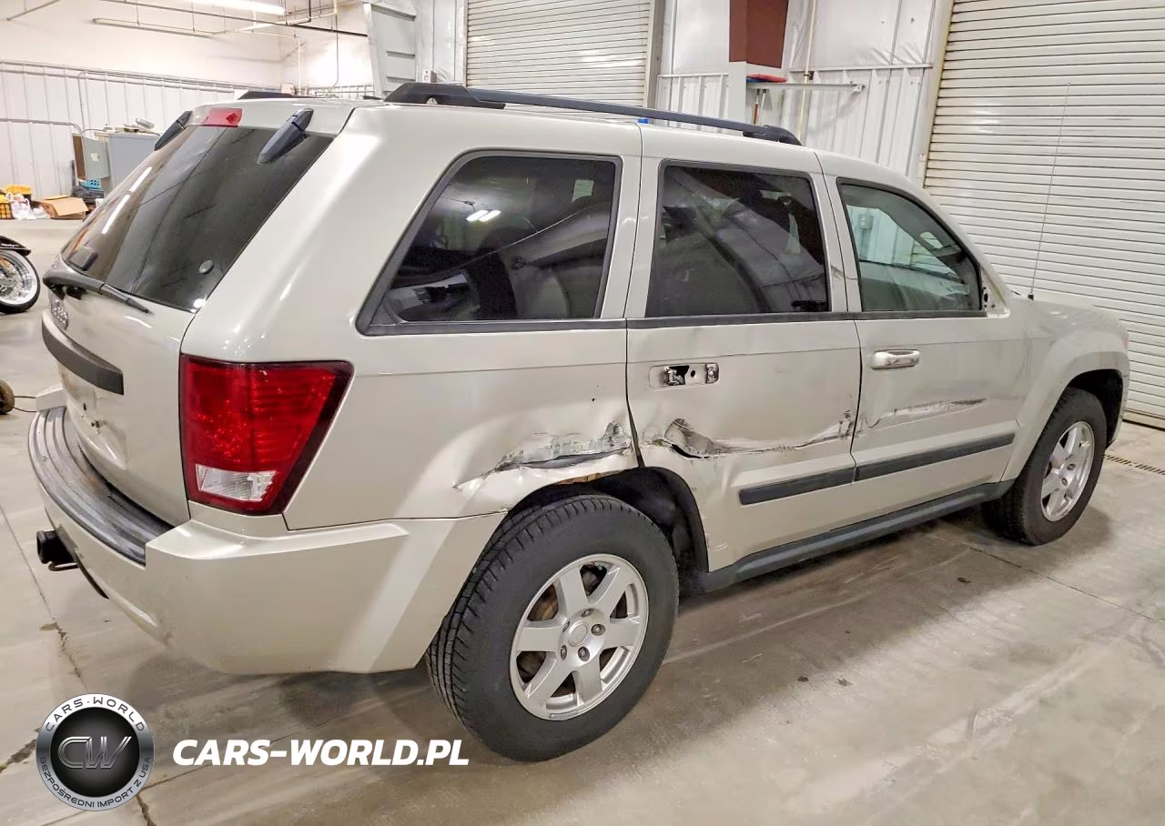 2009 Jeep Grand Cherokee Laredo VIN:1J8HR48P49C552638 - 3