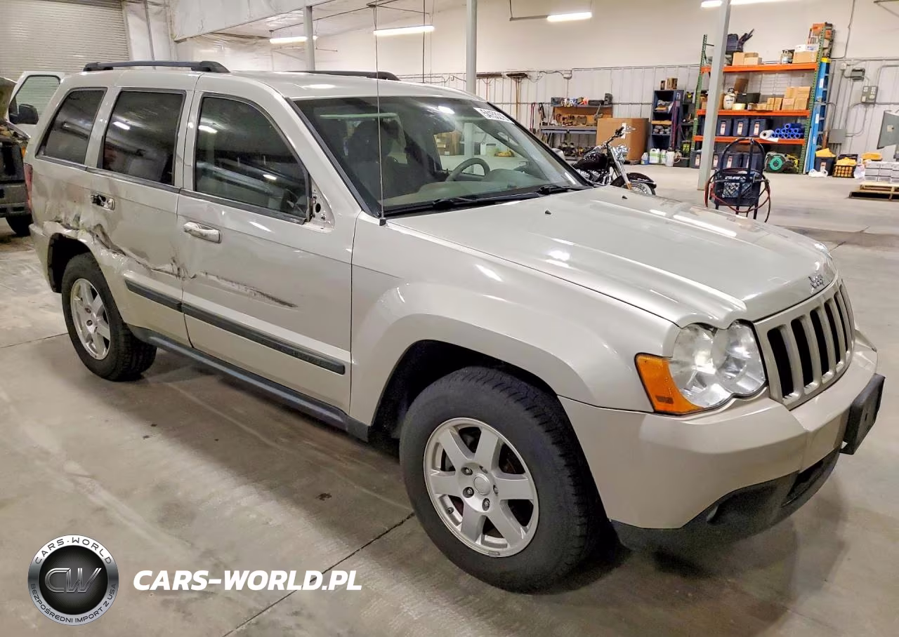 2009 Jeep Grand Cherokee Laredo VIN:1J8HR48P49C552638 - 4