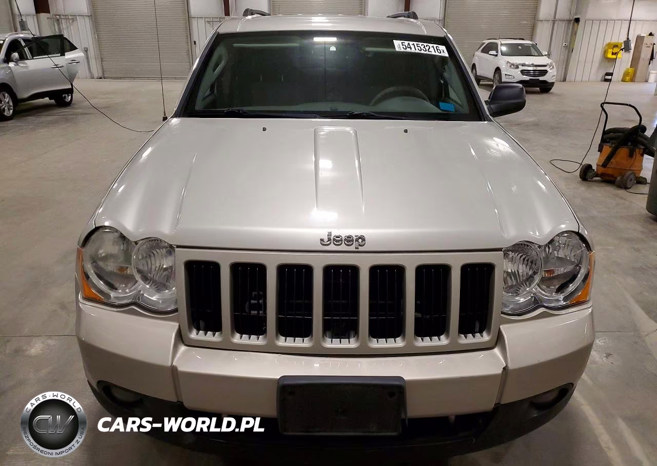 2009 Jeep Grand Cherokee Laredo VIN:1J8HR48P49C552638 - 5