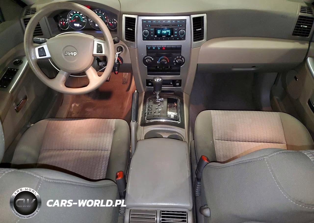 2009 Jeep Grand Cherokee Laredo VIN:1J8HR48P49C552638 - 8