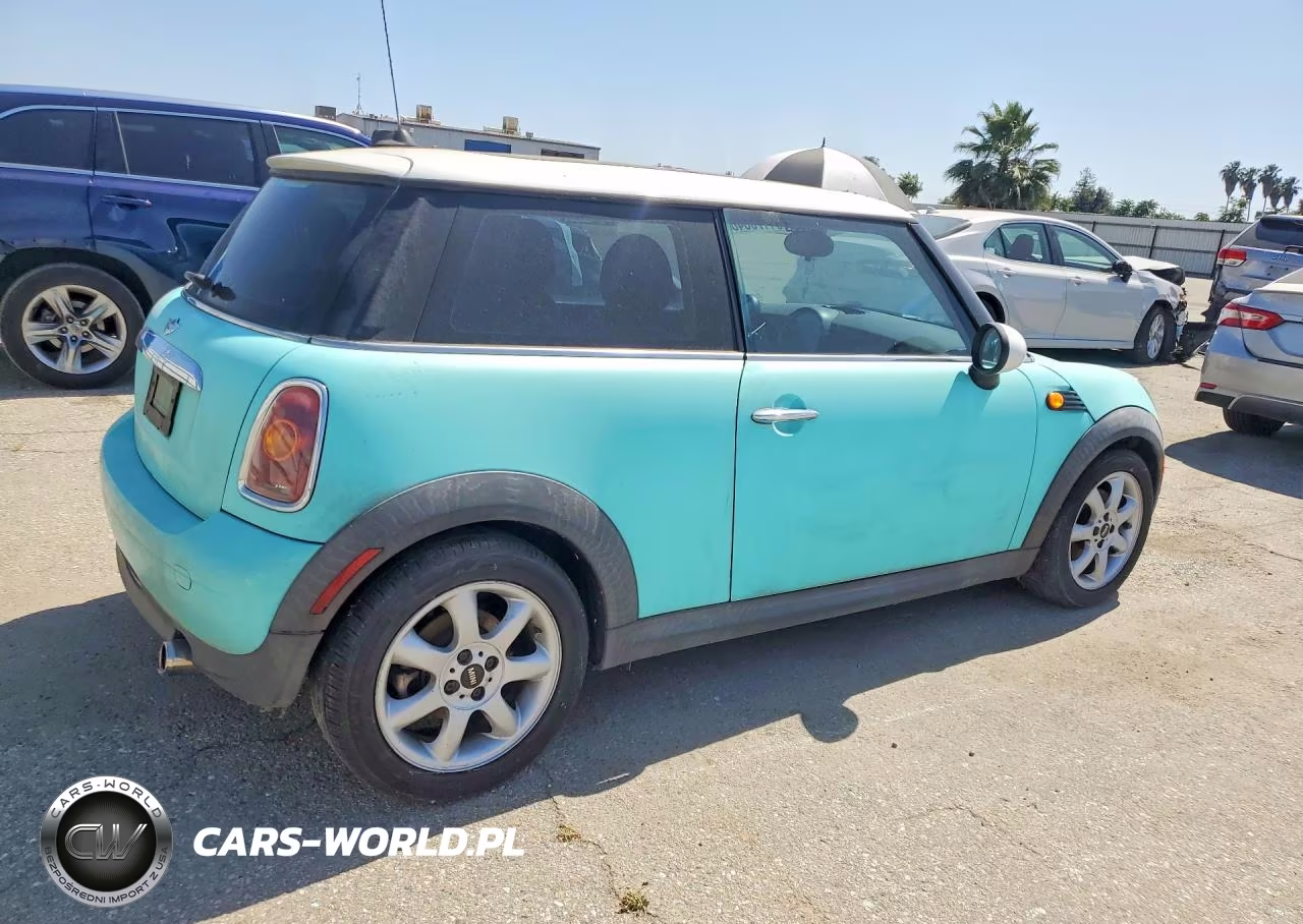 2009 Mini Cooper VIN:WMWMF33519TW79262 - 3