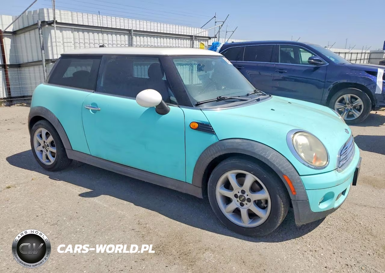 2009 Mini Cooper VIN:WMWMF33519TW79262 - 4