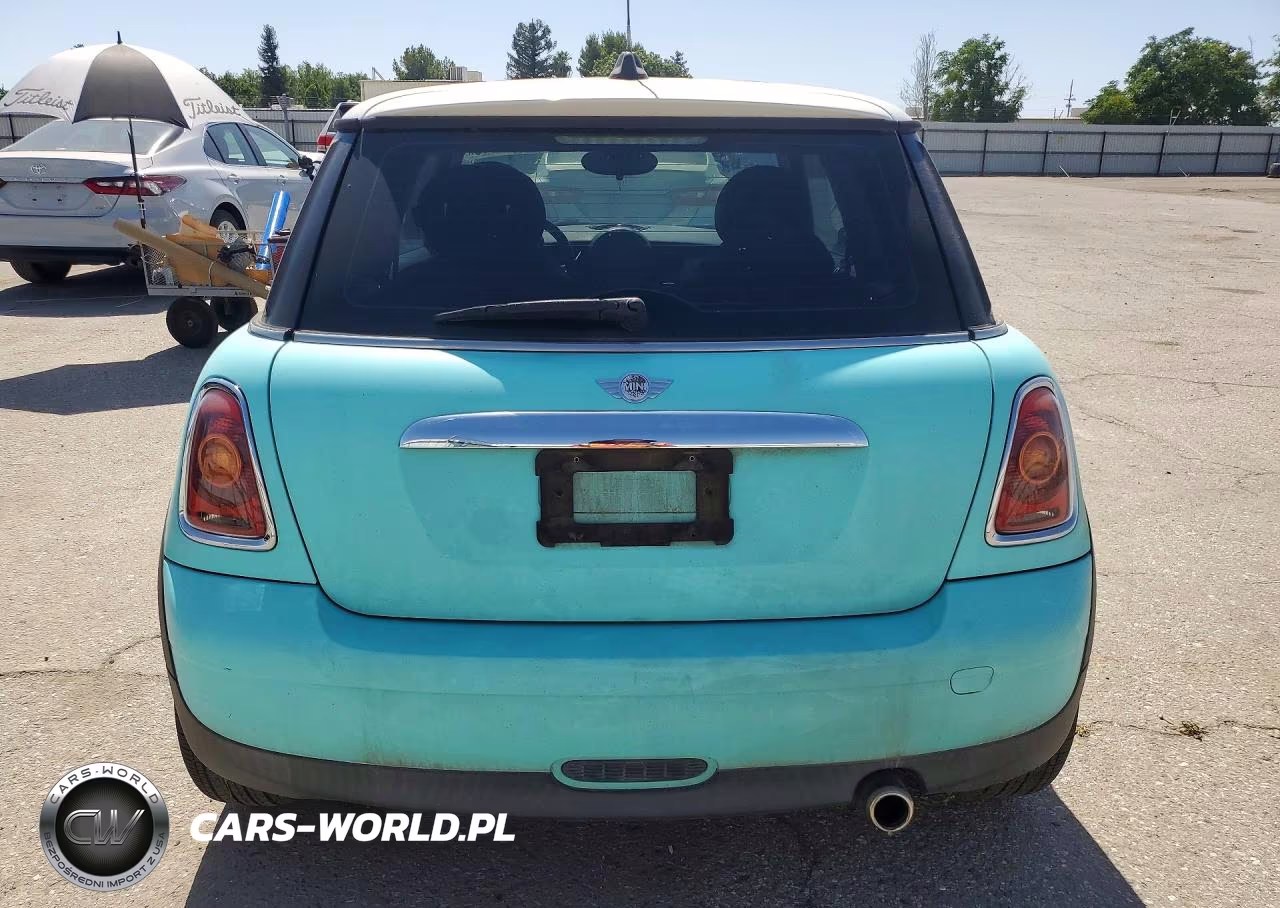 2009 Mini Cooper VIN:WMWMF33519TW79262 - 6