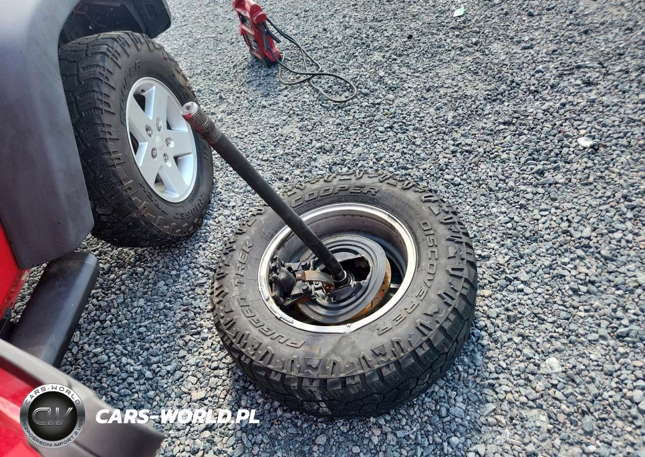 2011 Jeep Wrangler Sport VIN:1J4AA2D12BL601888 - 12