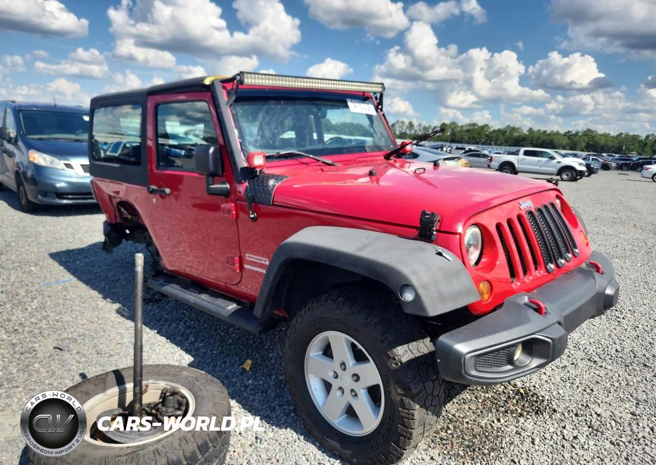 2011 Jeep Wrangler Sport VIN:1J4AA2D12BL601888 - 4