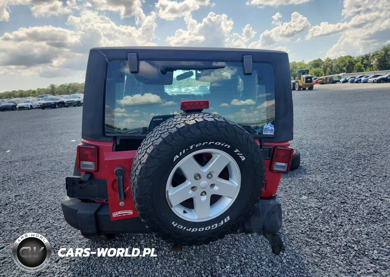 2011 Jeep Wrangler Sport VIN:1J4AA2D12BL601888 - 6