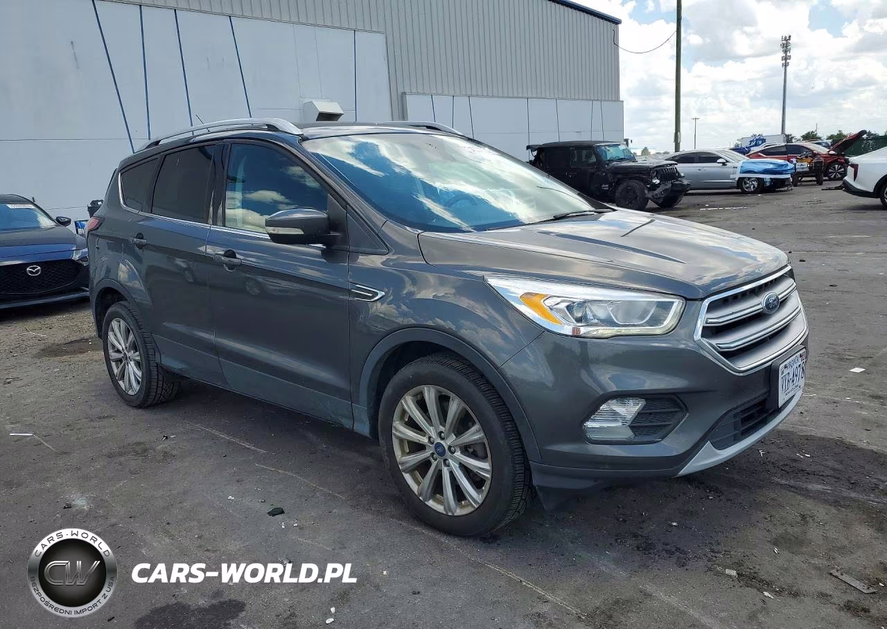 2017 Ford Escape Titanium VIN:1FMCU9J92HUE86989 - 4