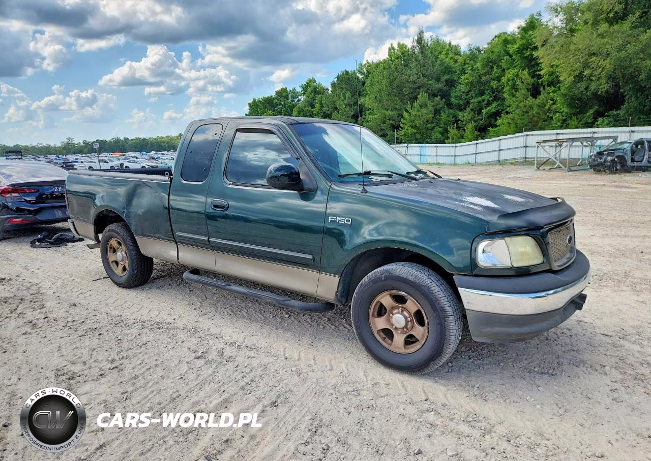 2002 Ford F150 VIN:1FTRX17222NB40945 - 4