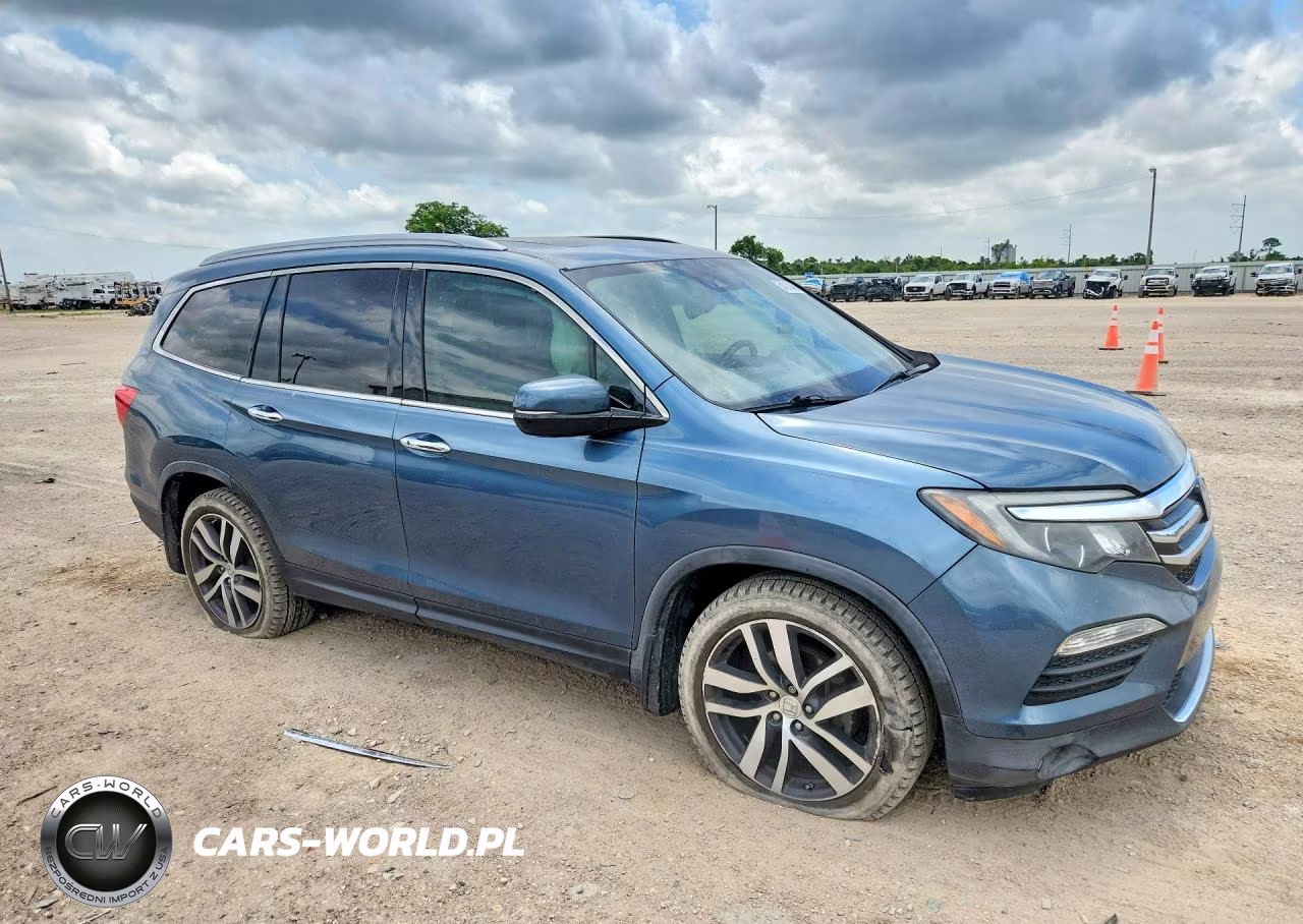 2018 Honda Pilot Elite VIN:5FNYF6H05JB041882 - 4