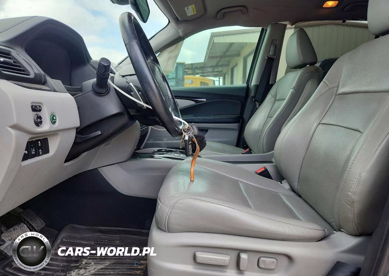2018 Honda Pilot Elite VIN:5FNYF6H05JB041882 - 7