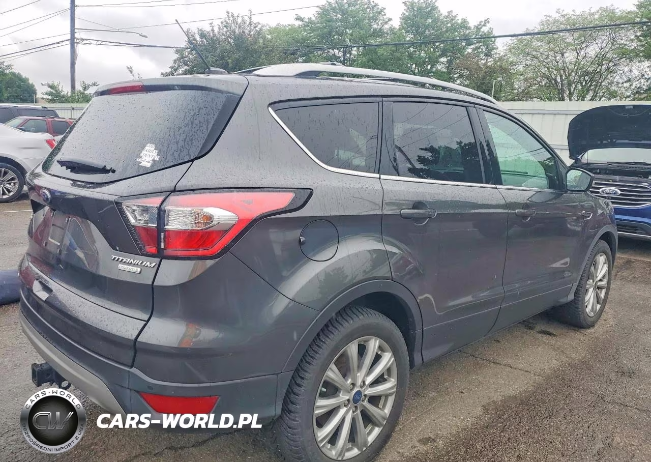 2017 Ford Escape Titanium VIN:1FMCU0J94HUF10317 - 3