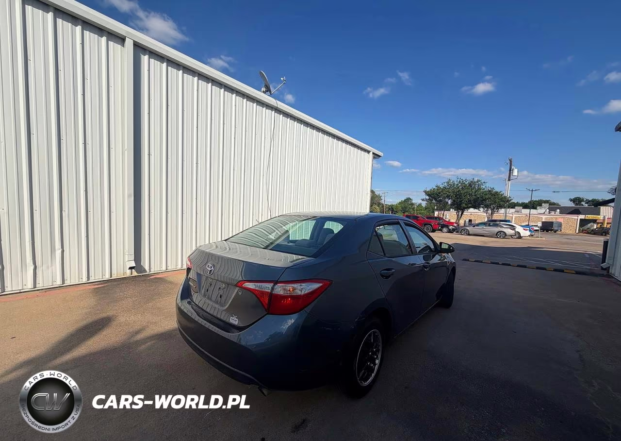 2015 Toyota Corolla L VIN:5YFBURHE9FP353546 - 4