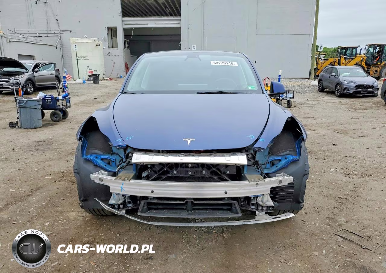 2023 Tesla Model Y VIN:7SAYGDEE8PF704519 - 5