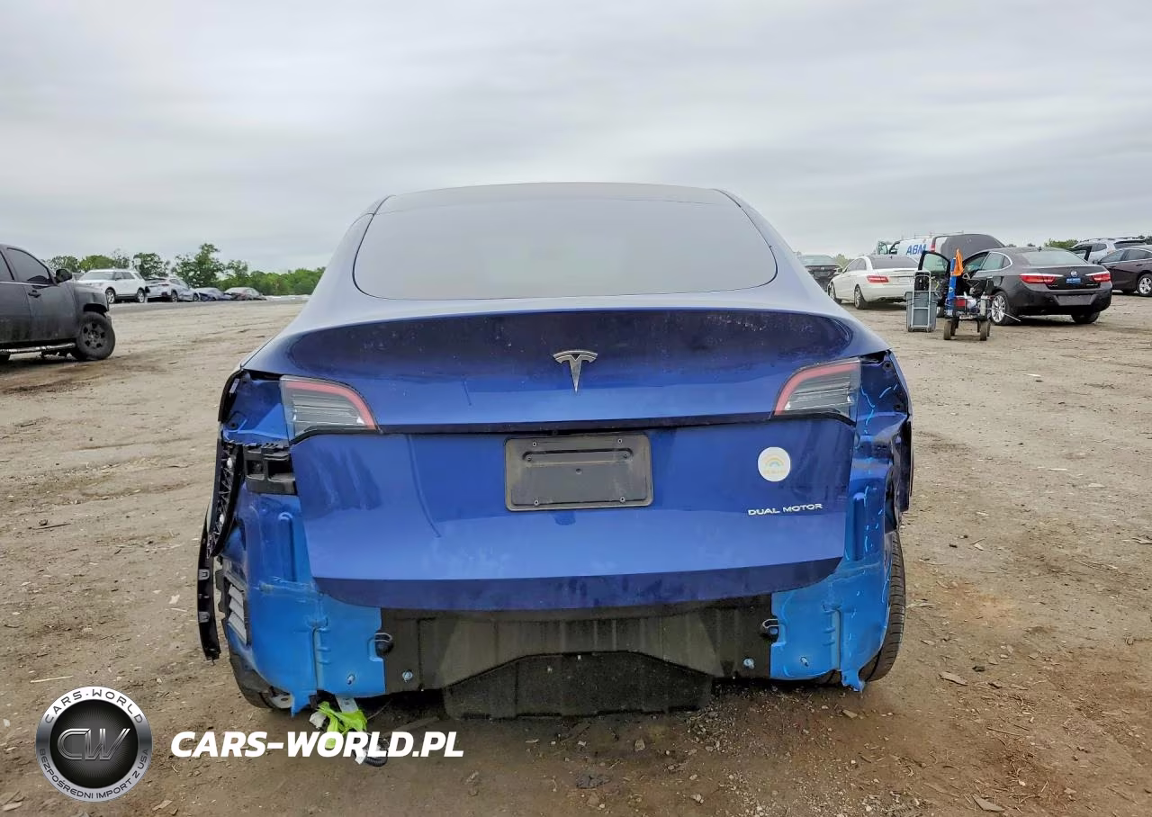 2023 Tesla Model Y VIN:7SAYGDEE8PF704519 - 6