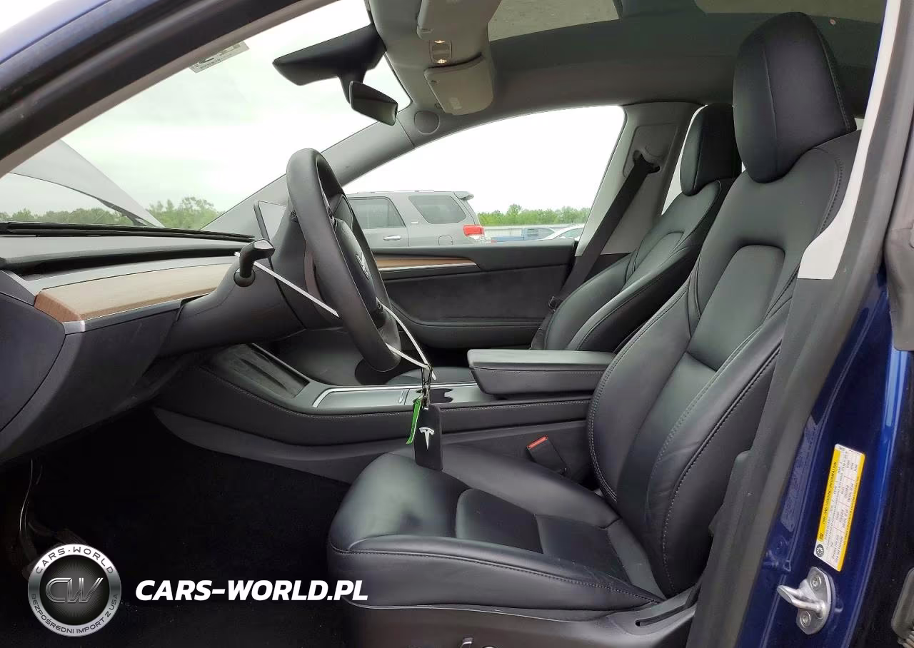 2023 Tesla Model Y VIN:7SAYGDEE8PF704519 - 7