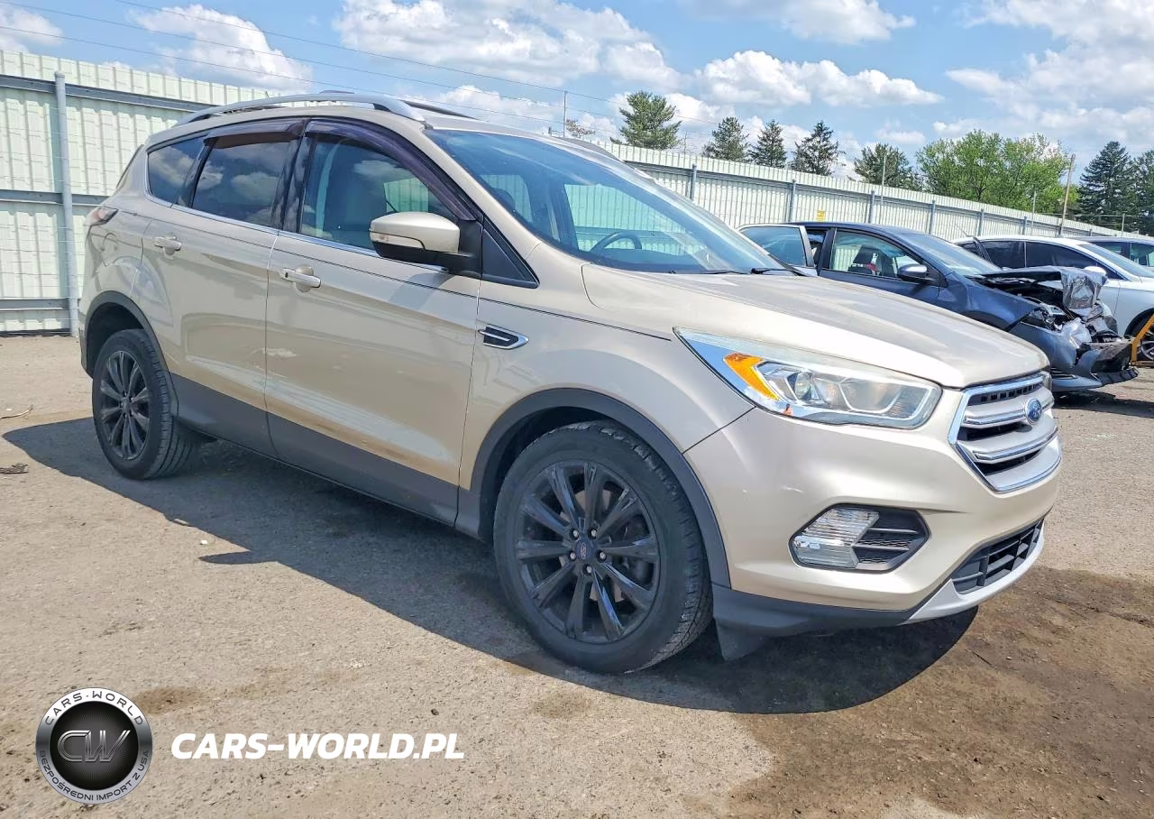 2017 Ford Escape Titanium VIN:1FMCU9JD0HUA18134 - 4