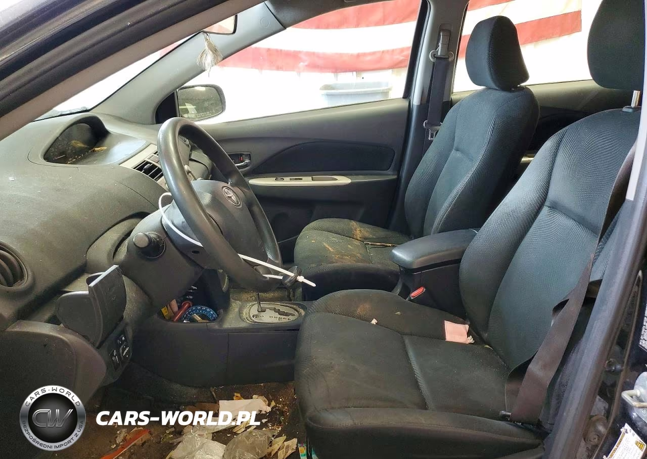 2009 Toyota Yaris Base VIN:JTDBT903894054103 - 7