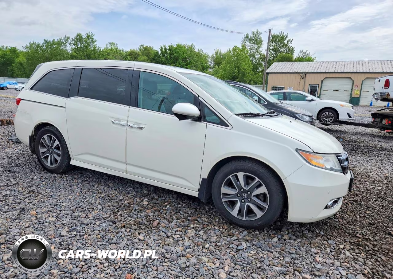 2016 Honda Odyssey Touring VIN:5FNRL5H97GB031529 - 4