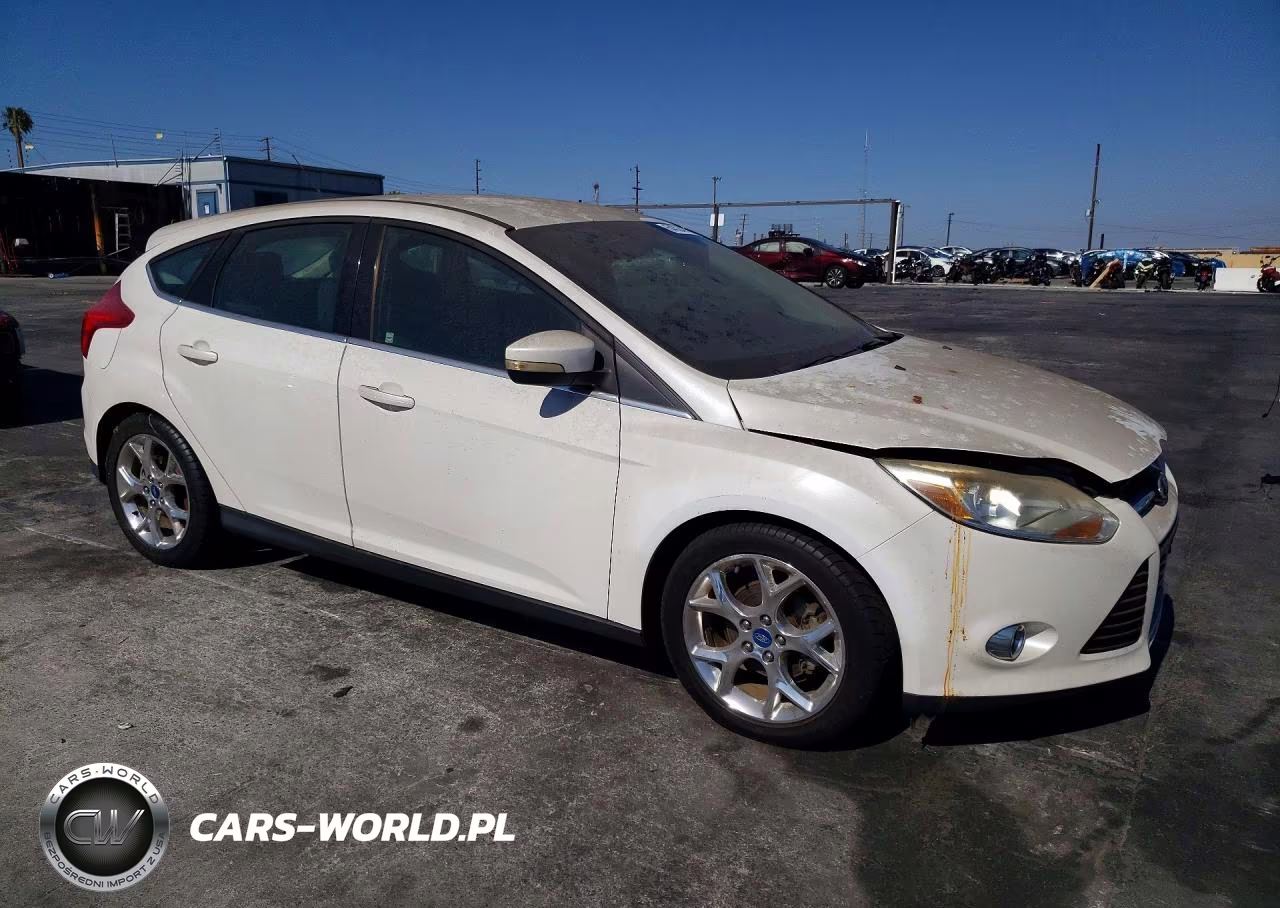 2012 Ford Focus VIN:1FAHP3M22CL257679 - 4