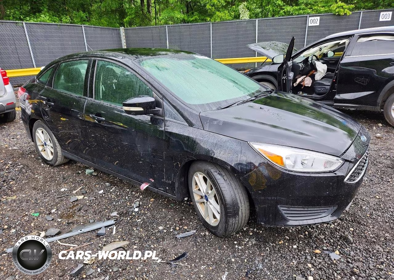 2016 Ford Focus VIN:1FADP3F20GL402865 - 4