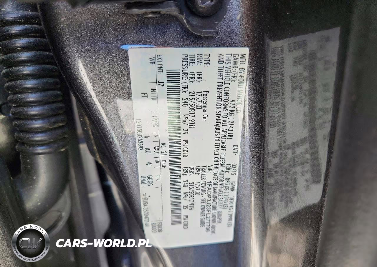 2015 Ford Focus Titanium VIN:1FADP3J23FL277706 - 12