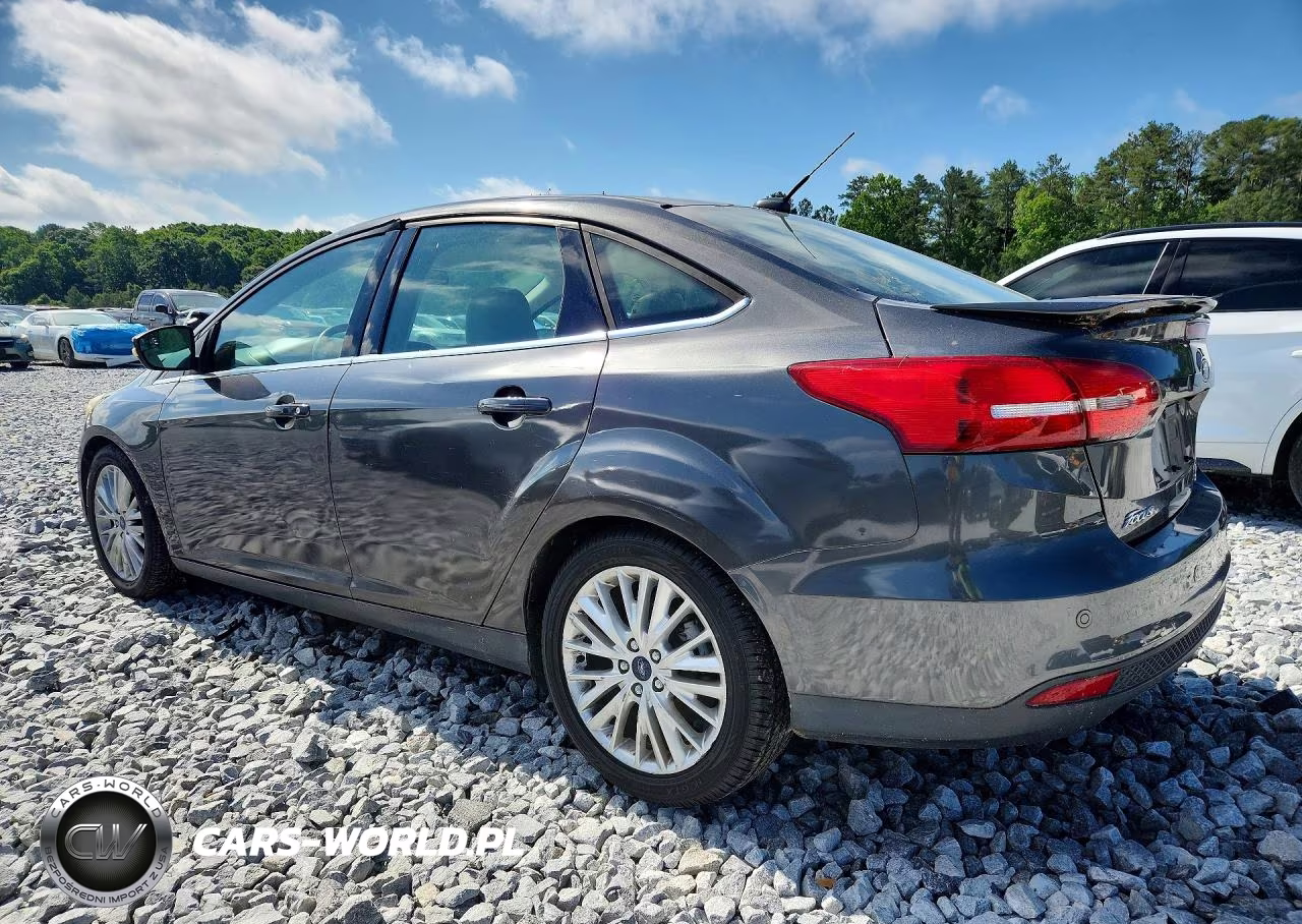 2015 Ford Focus Titanium VIN:1FADP3J23FL277706 - 2
