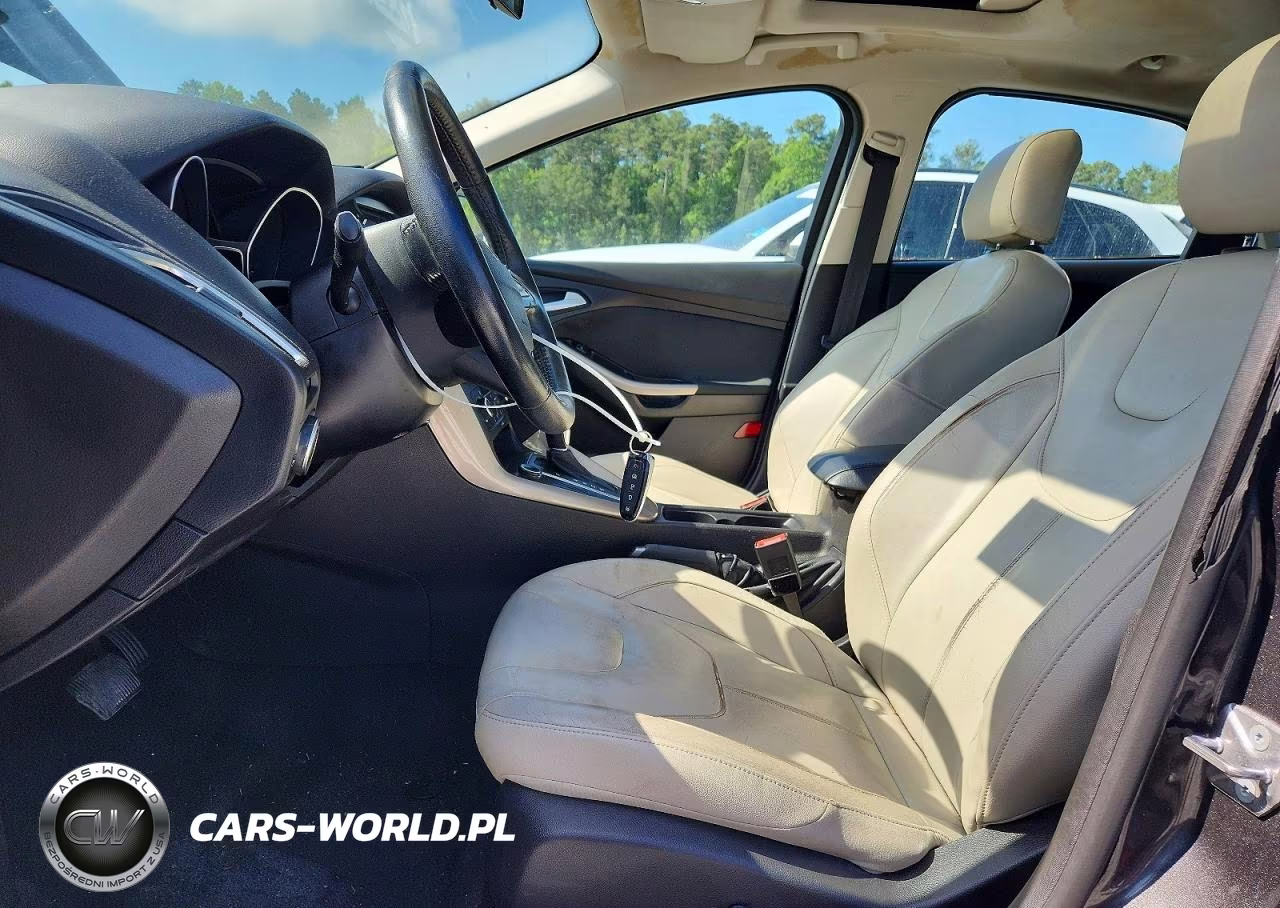 2015 Ford Focus Titanium VIN:1FADP3J23FL277706 - 7