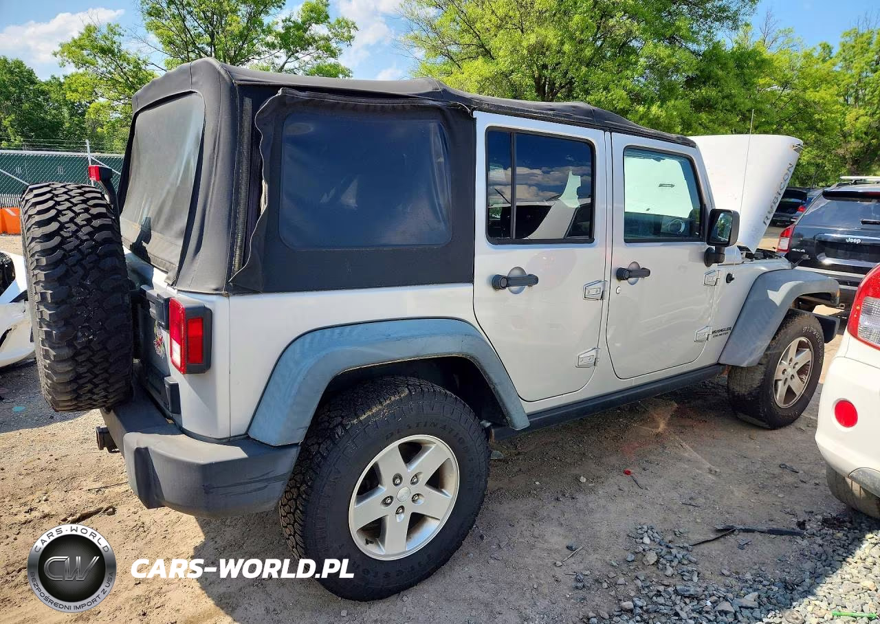 2011 Jeep Wrangler Unlimited Rubicon VIN:1J4BA6H13BL507895 - 3