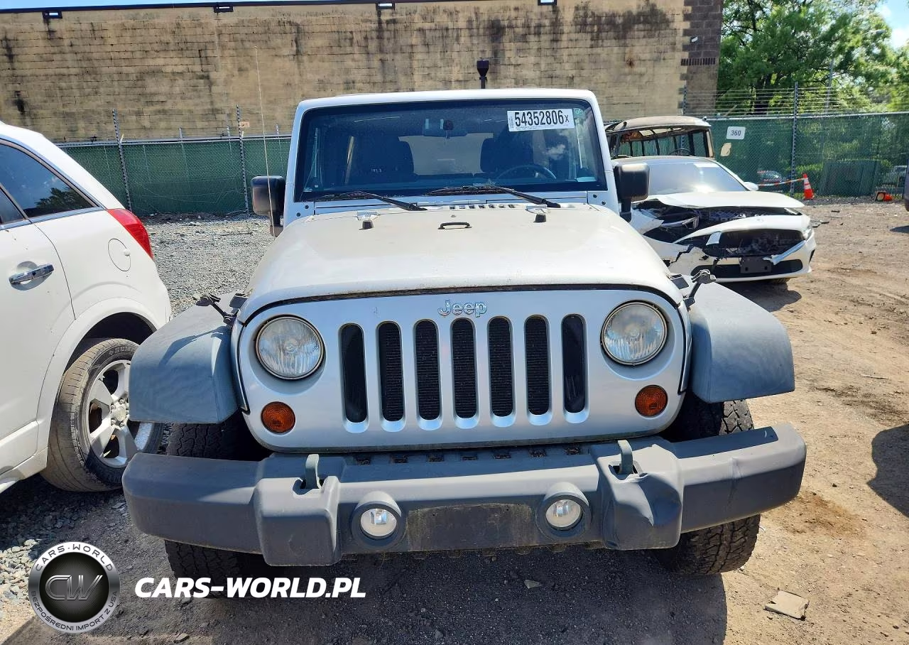 2011 Jeep Wrangler Unlimited Rubicon VIN:1J4BA6H13BL507895 - 5