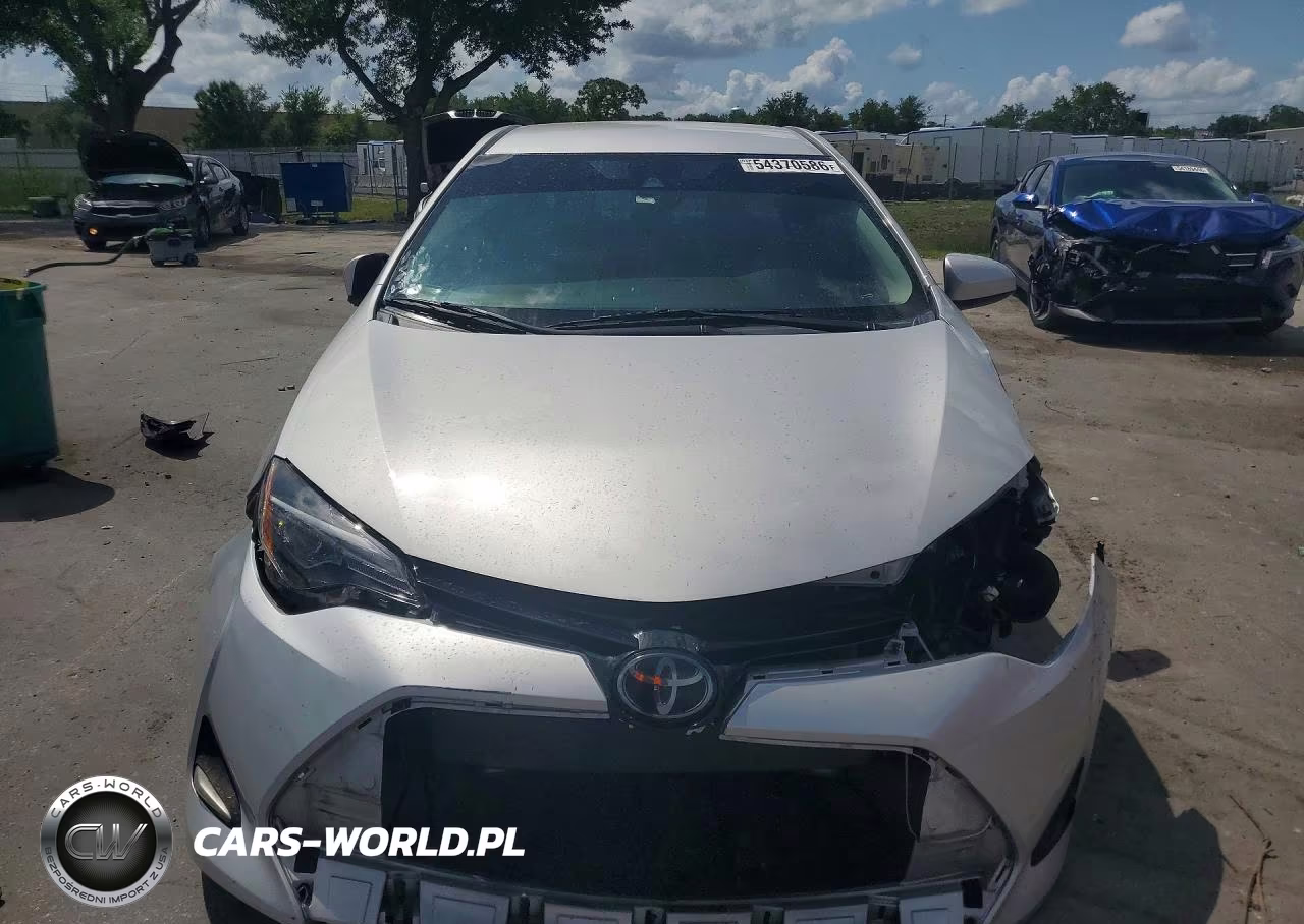 2018 Toyota Corolla Le VIN:5YFBURHE0JP821074 - 5