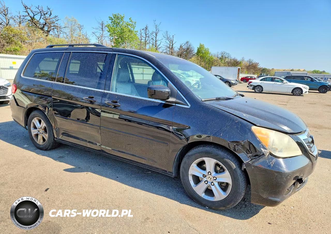 2010 Honda Oddyssey VIN:5FNRL3H95AB102058 - 4