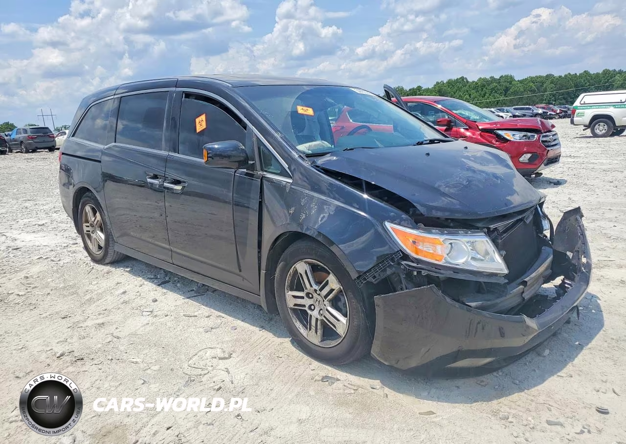 2011 Honda Odyssey Touring VIN:5FNRL5H95BB011210 - 4