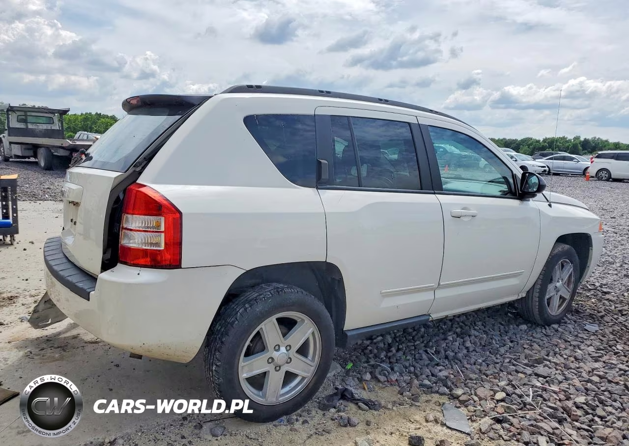 2010 Jeep Compass Sport VIN:1J4NT4FA7AD515408 - 3