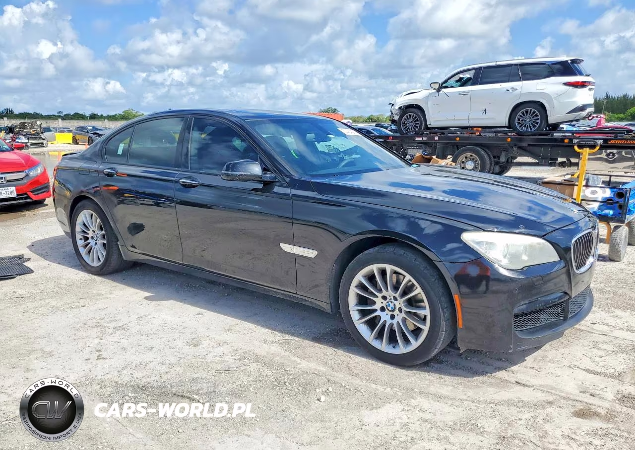2015 BMW 740 I VIN:WBAYA6C58FGK16332 - 4