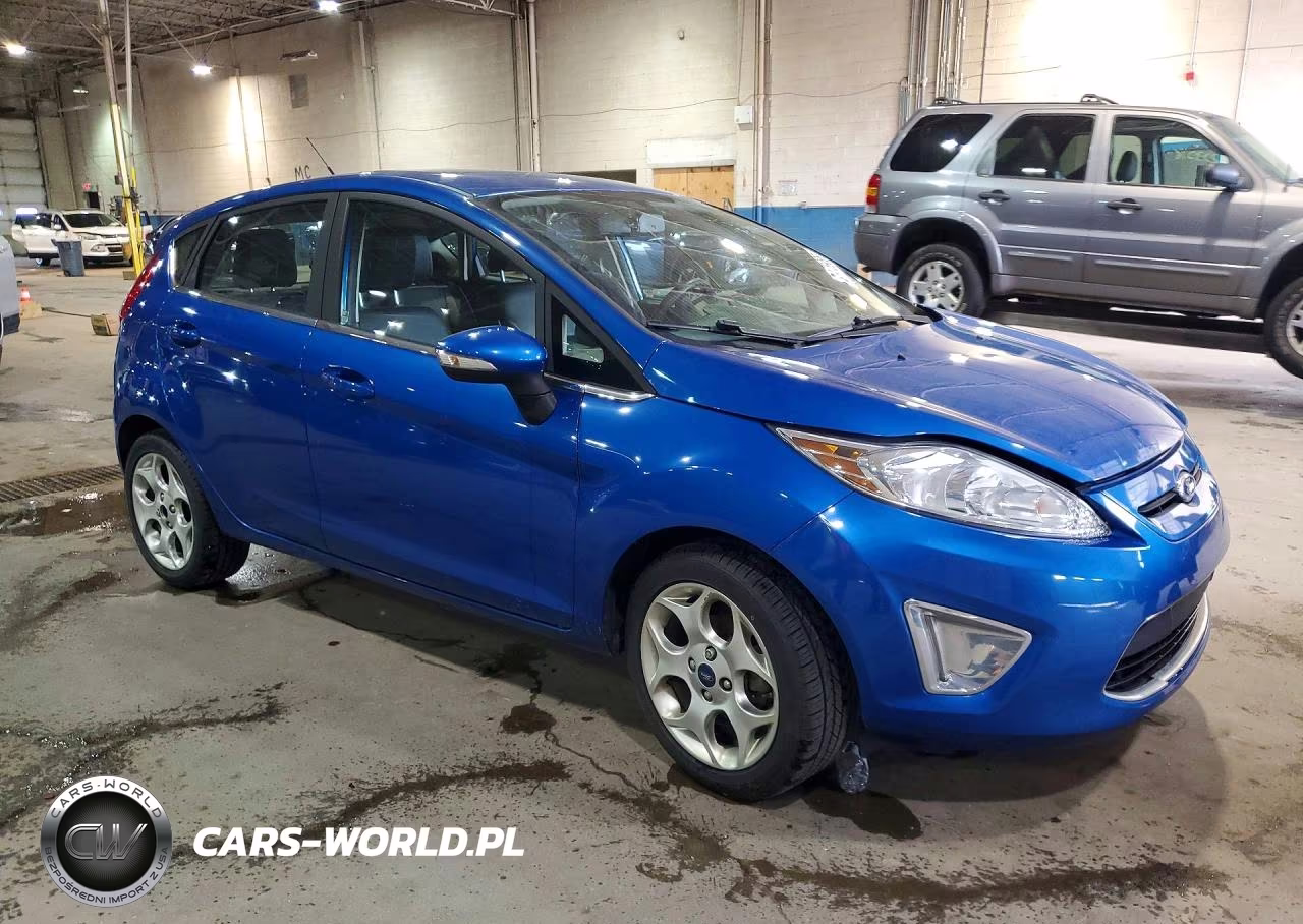 2011 Ford Fiesta Ses VIN:3FADP4FJ4BM196261 - 4