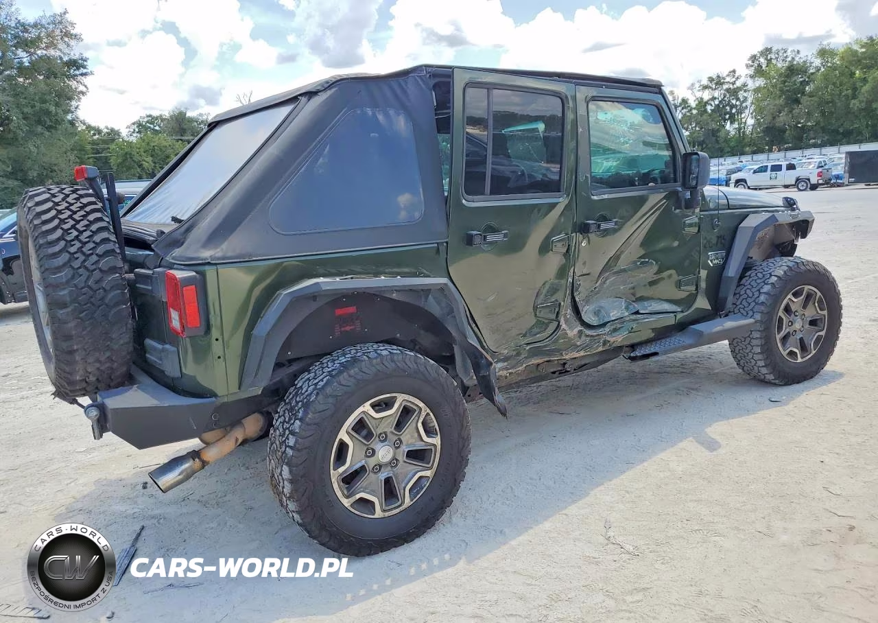 2009 Jeep Wrangler Unlimited Sahara VIN:1J4GA59119L717033 - 3