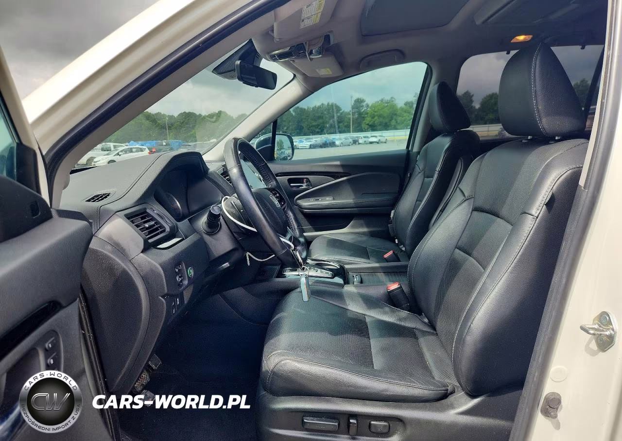 2019 Honda Pilot Elite VIN:5FNYF6H09KB000107 - 7