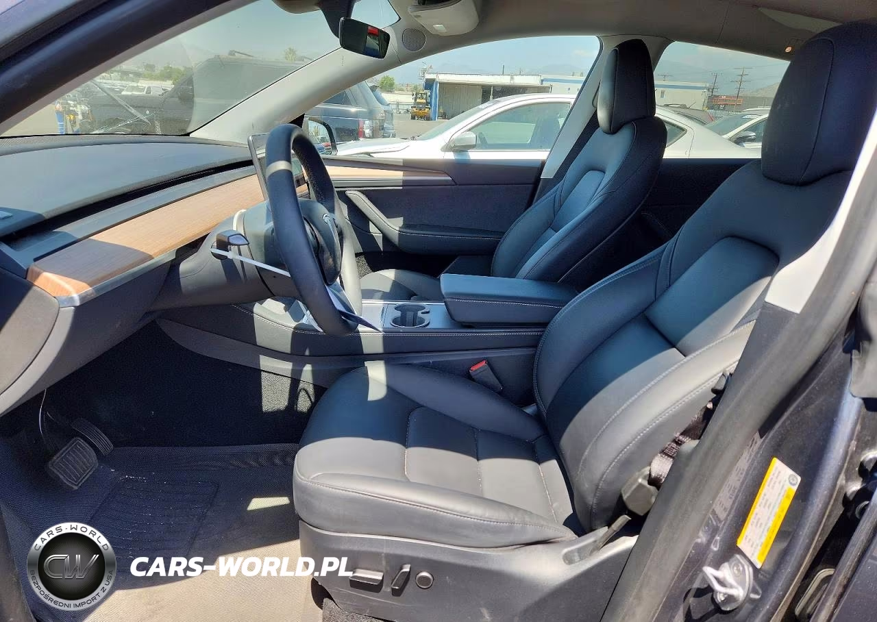 2023 Tesla Model Y VIN:7SAYGDEE6PA151219 - 7