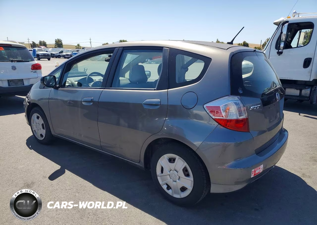 2012 Honda Fit VIN:JHMGE8H3XCC000473 - 2