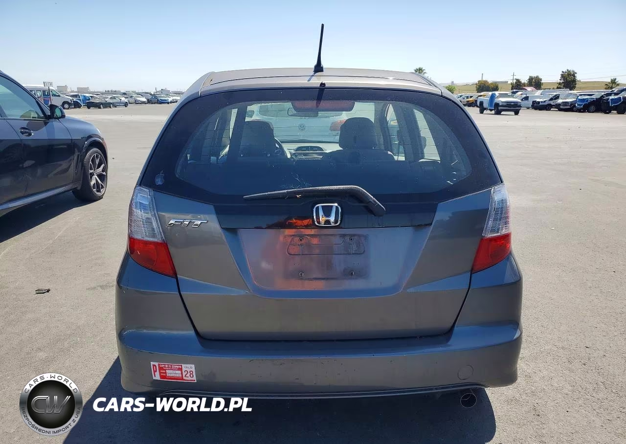 2012 Honda Fit VIN:JHMGE8H3XCC000473 - 6