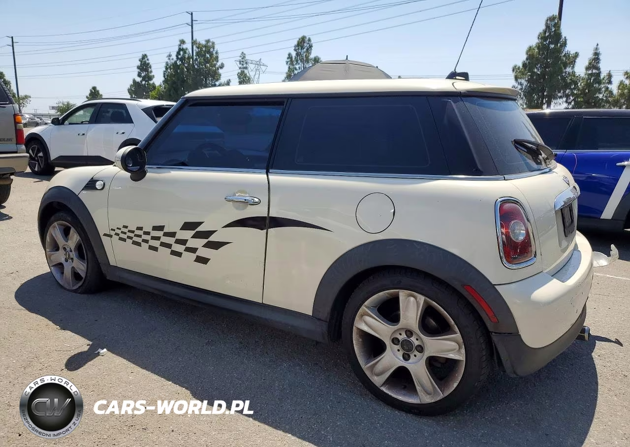 2009 Mini Cooper VIN:WMWMF33559TW79765 - 2