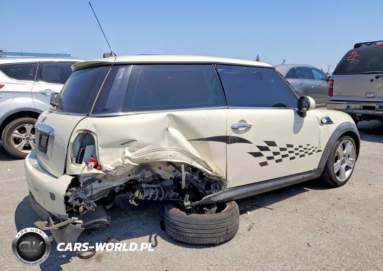 2009 Mini Cooper VIN:WMWMF33559TW79765 - 3