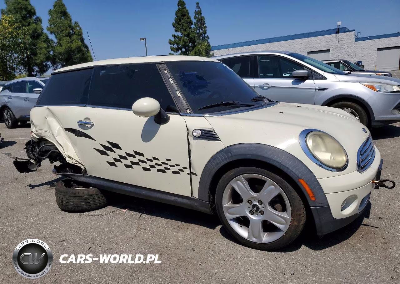2009 Mini Cooper VIN:WMWMF33559TW79765 - 4