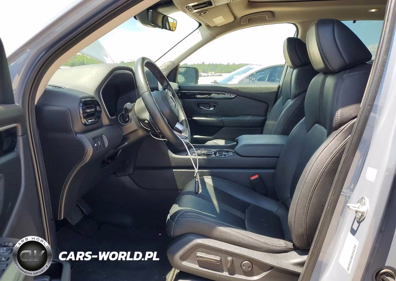 2023 Honda Pilot Touring VIN:5FNYG1H78PB030395 - 7