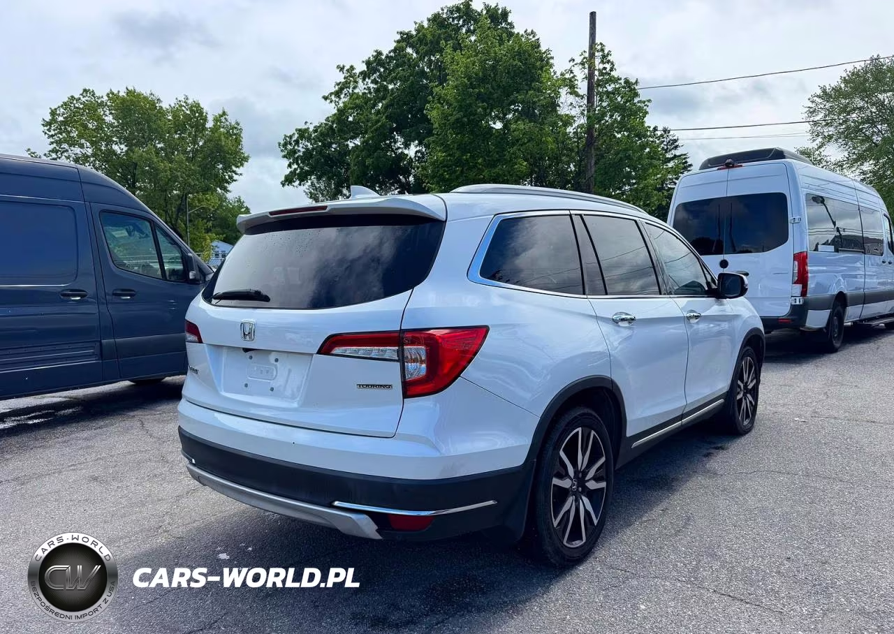 2022 Honda Pilot Touring VIN:5FNYF5H69NB016231 - 4