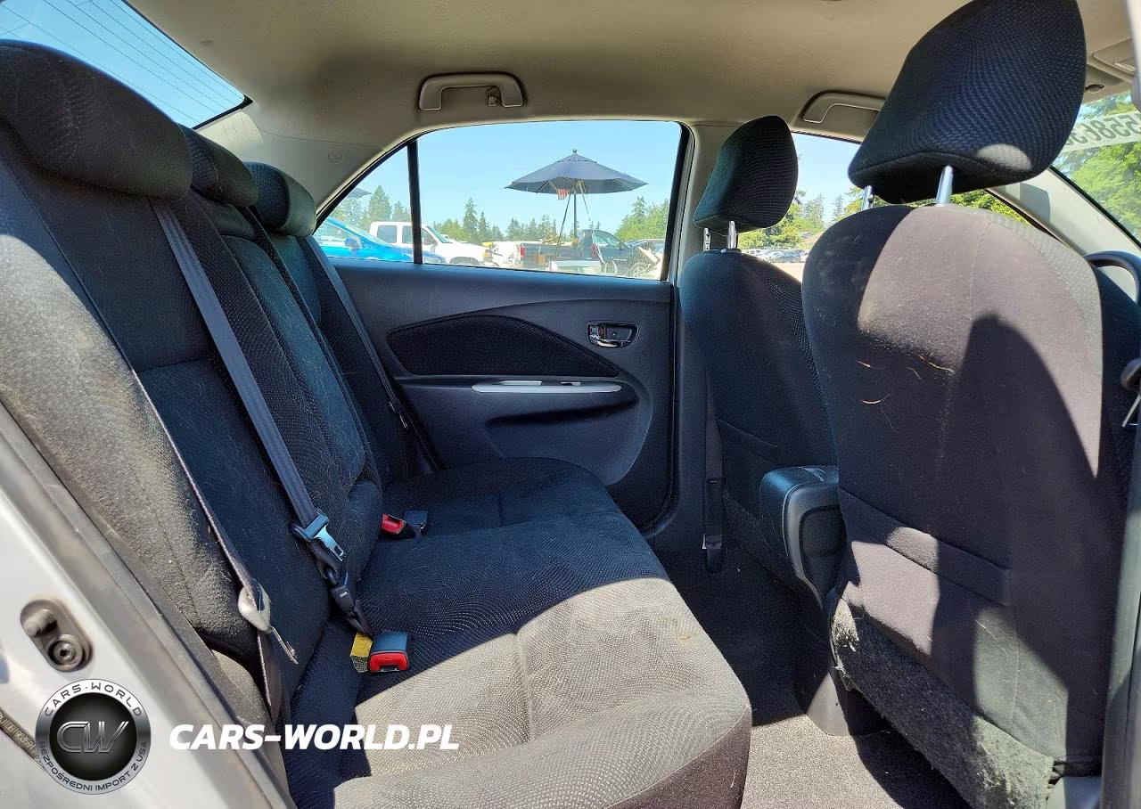 2009 Toyota Yaris Base VIN:JTDBT903591311235 - 10