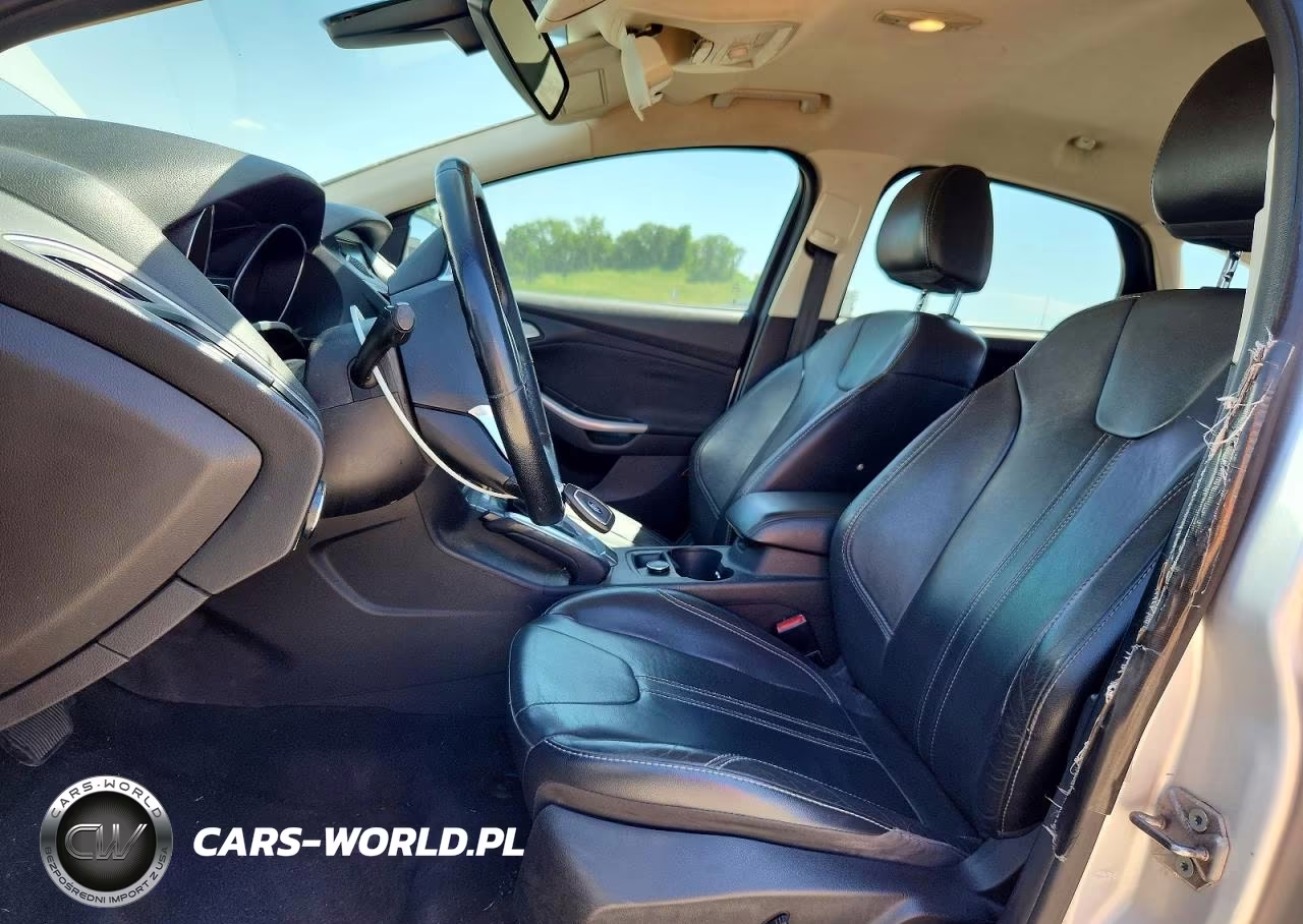 2012 Ford Focus Titanium VIN:1FAHP3N21CL480228 - 7