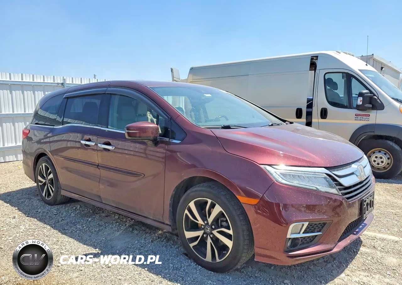 2018 Honda Odyssey Elite VIN:5FNRL6H93JB049717 - 4